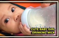 milk girl baby drinking bottle cute