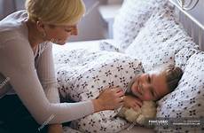 mother her wakes daughter morning stock