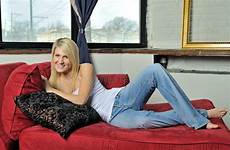 couch blonde woman lounging relaxing beautiful tank jeans dreamstime stock