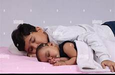 sleeping indian brother sister besides lying young his alamy
