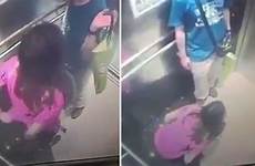 caught urinating woman cctv lift mirror looks holds companion bag male