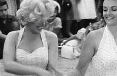 marilyn saluti guida 1953 chinese russel shaking gentlemen prefer blondes