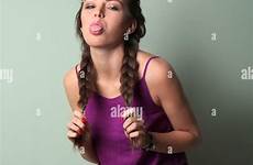 naughty young girl woman alamy stock portrait background color