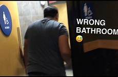 bathroom into girls walks guy