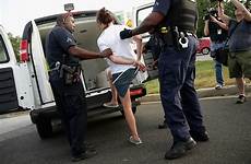 woman police arrested walmart handcuffed women arrest prostitution car sting into cuffs kids van outside being gets getty maine during