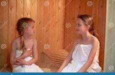sauna girls other each towels two sitting looking finnish wrapped dreamstime sister