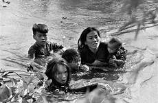 vietnamese fleeing flee 1965 pulitzer bettmann nhon bombing safety civilians sawada