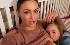 mom breastfeeding daughter old her year still has