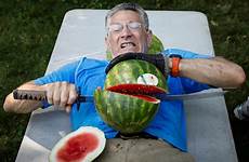 guinness record records watermelons man stomach half ashrita slicing slices furman his most who sets set weird size