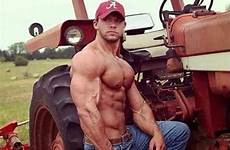 lifting weight cowboys guy gympaws muscular physique muddy