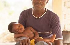 father african his man story sight brought checked medical eyes wife team her