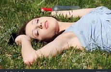 drunk sleeping woman young grass alcohol bottle sunny next day shutterstock stock search