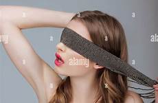 face holding seek strap hide woman her puzzle stock alamy bandage