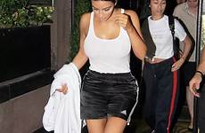 kardashian braless cleavage flashing accompanied assistant