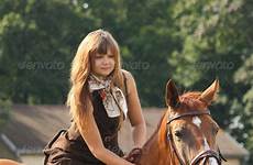 horse girl riding horses beautiful teenager brown teens field flowers photography stock photodune teenage buy choose board