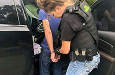 police handcuffed female cop women escorted officers