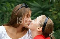 kissing girls teenage outdoors stock premium freeimages istock getty