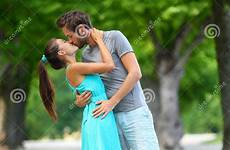 couple kiss love body summer lovers full kissing young park standing passionately path portrait first caucasian stock girls