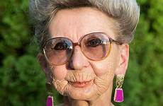 70 old woman years over looking glasses portrait senior wearing