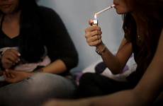 indonesia sex prostitution money kids teenage pimp her child room house depressing reaches level
