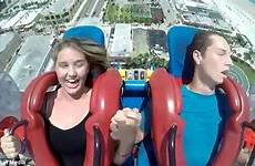 ride his friend slingshot he harness her rollercoaster fairground forth knocked flails arm seat back after unknowingly