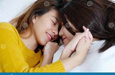 bed lesbians cute smiling lgbt lying asia young lesbian thumbs asian happy