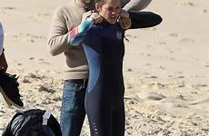 cotillard marion canet guillaume ferret cap wetsuit hits wave husband france put gets help she category back
