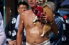 fundoshi shirtless japanese man loincloth wrapped traditional alamy stock waist carrying pet local dog his akita festival