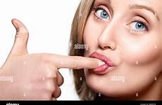 woman her licking finger stock alamy nose fly caucasian close