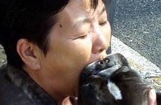 dog japanese japan woman eats raw