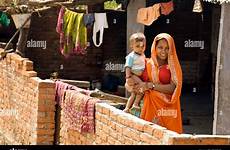 village mother baby her rajasthan alamy son india house