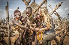 tribes ethiopian surma people ethiopia suri tribe children most who their they life body extreme baby teeth touch huge
