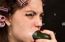 cucumber woman women eating stock fun alamy