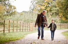 grandfather walk grandson countryside walking son autumn together stock happier older hope pain royalty ratehub ca nu his management