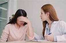 exam asian talking doctor unhappy patient wo teenage room professional submit