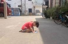 girl forced year old homework sun little do china knees hot hours chinasmack her punished kneeling eight father