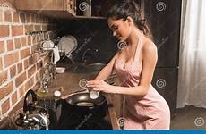 apron cooking woman beautiful smiling young frying pan kitchen dreamstime preview