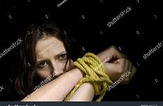 kidnapped tied rope woman abused victim stress hostage emotional missing hands locked search shutterstock stock