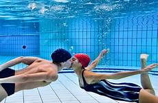 pool swimming couple kissing