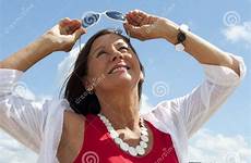 mature woman sunny relaxing day stock waterfront enjoying relaxed sunshine attractive standing holiday while happy