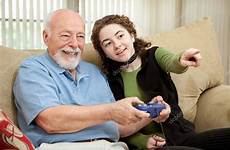 grandpa teen helps stock game depositphotos