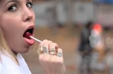 sucking licking lollipop