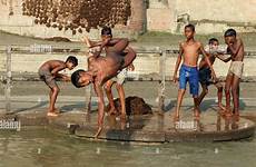 river indian children ganges playing varanasi alamy boys boy bathing stock india washing