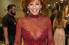 dress reba mcentire racy sheer sizzles reportedly engaged getty source she years perform wore ago does he love skeeter amomama