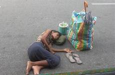 homeless vietnamese woman money give