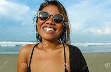 enjoying sunglasses shoulders holidays lifestyle portrait bikini asian head young beautiful girl cheerful attractive
