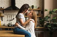 lesbian couple passionate kitchen young each loving other