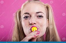 licking lollipop blond headshot