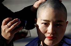 shave heads lawyer activists persecution detention