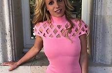 britney spears tight revealing flaunts physique toned posed window